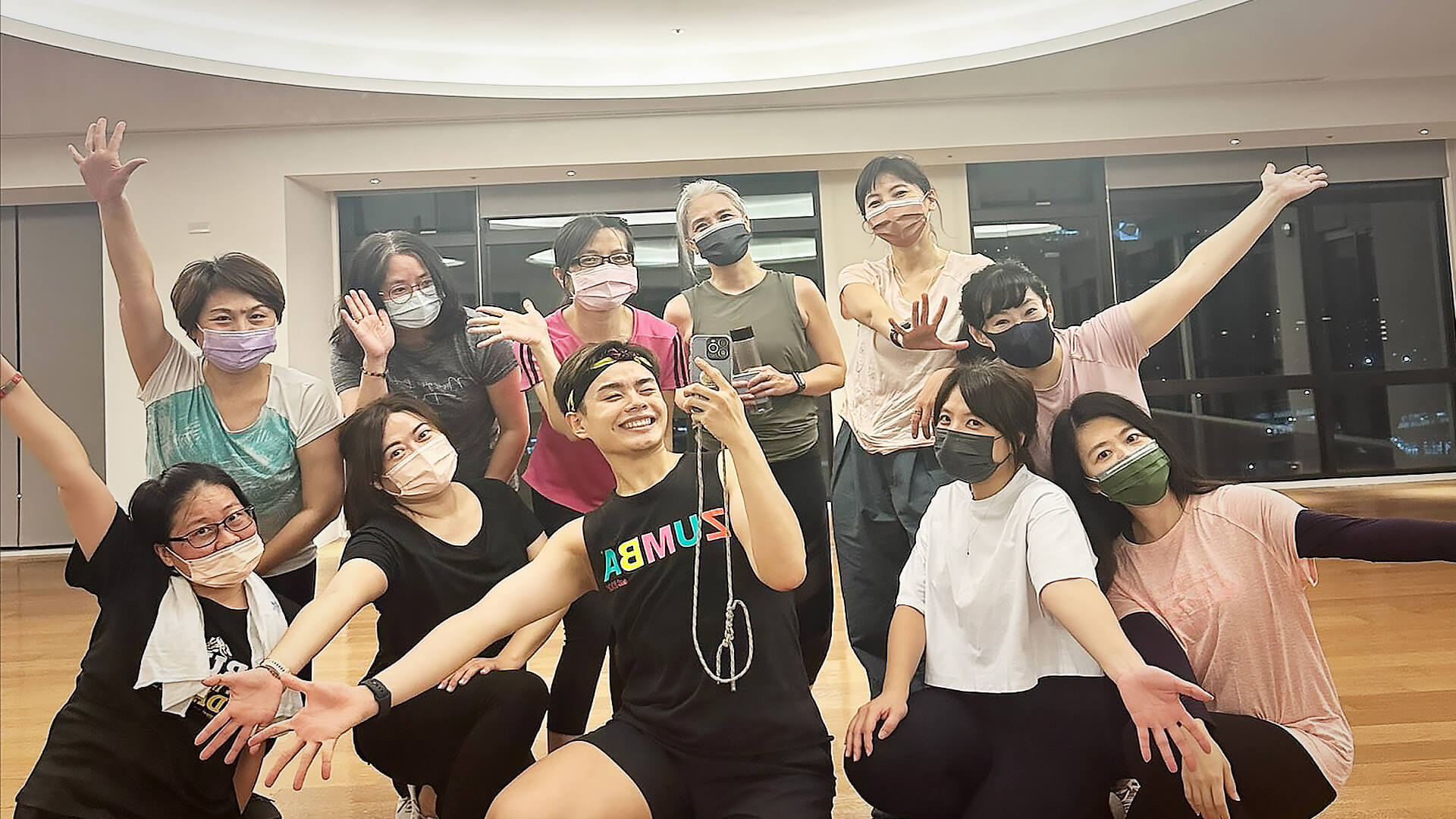 Ability staff dance club group photo with joyful poses