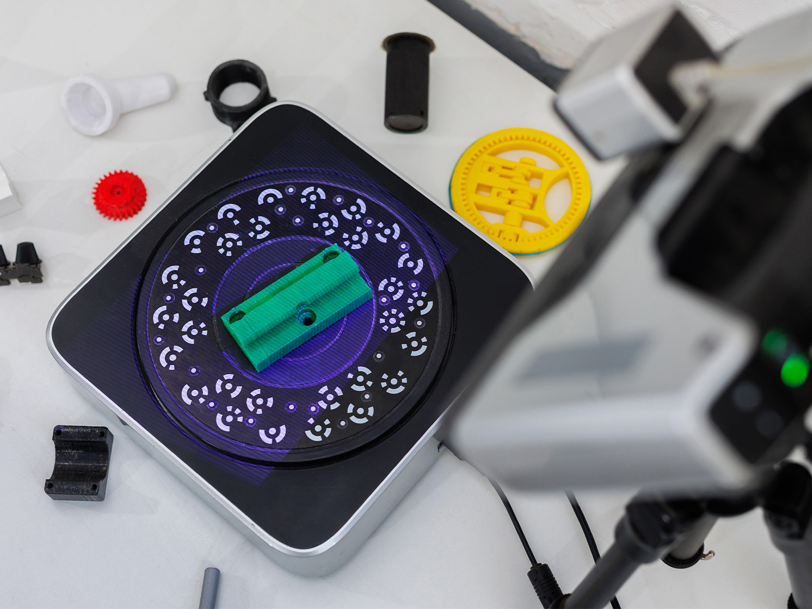 Precision mechanical components and 3D measurement device showing durable engineering design.