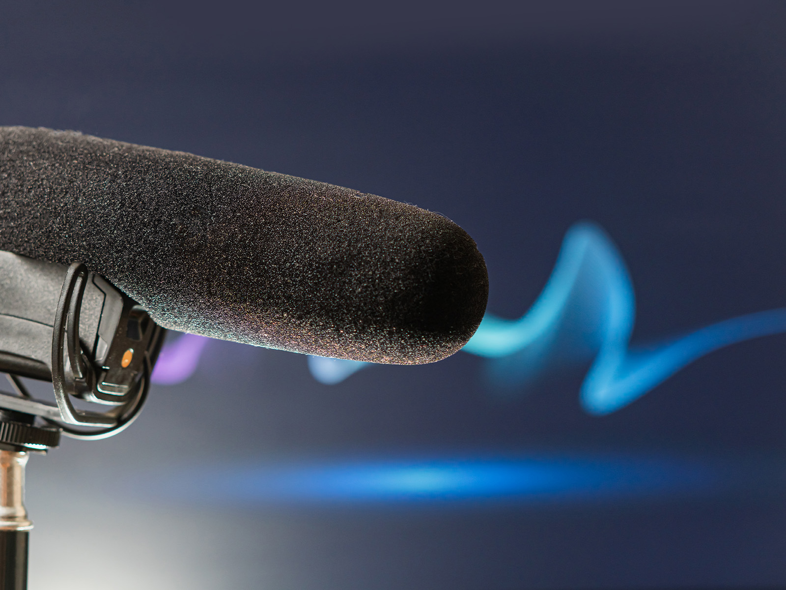 Close-up of a directional microphone illustrating advanced acoustic and smart audio technology.