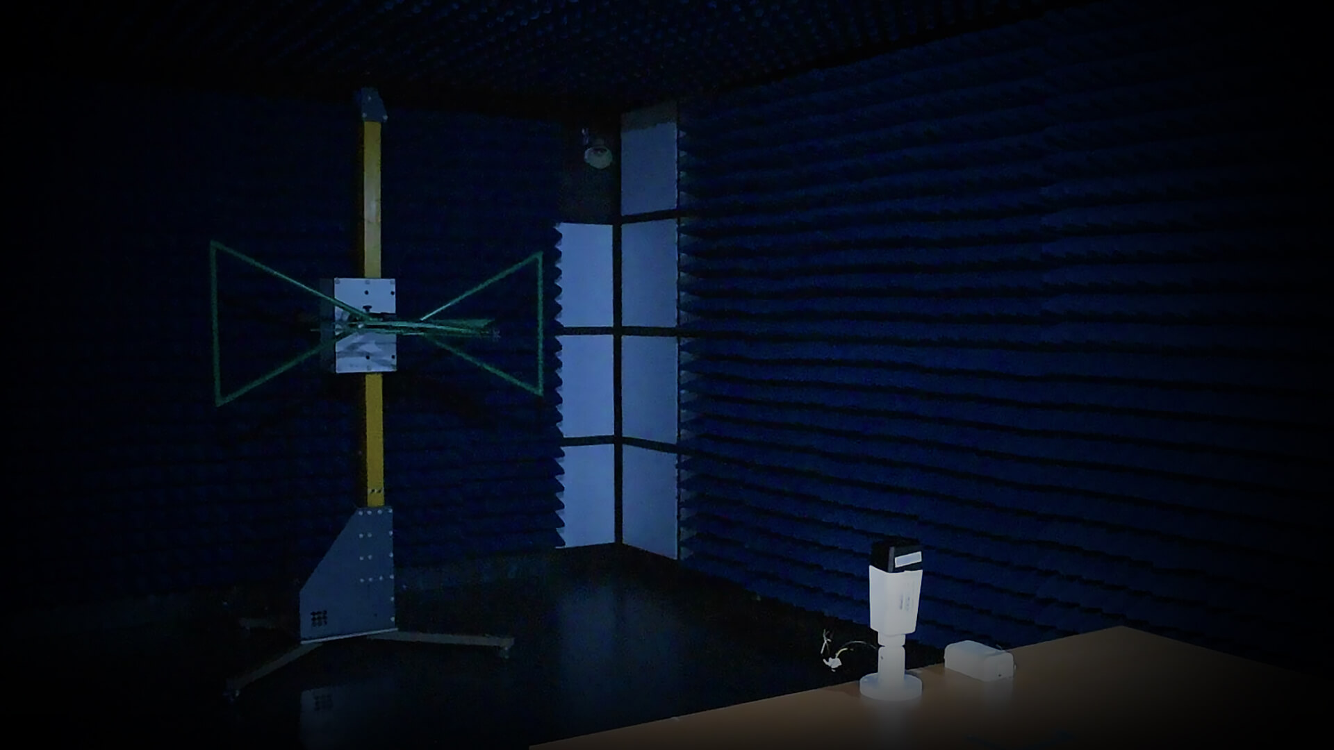 EMI test chamber equipped with absorber panels and antenna system for electromagnetic interference and compliance testing at Ability Enterprise